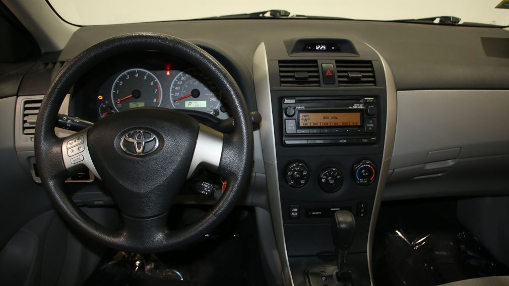 2012 Toyota Corolla LE #13