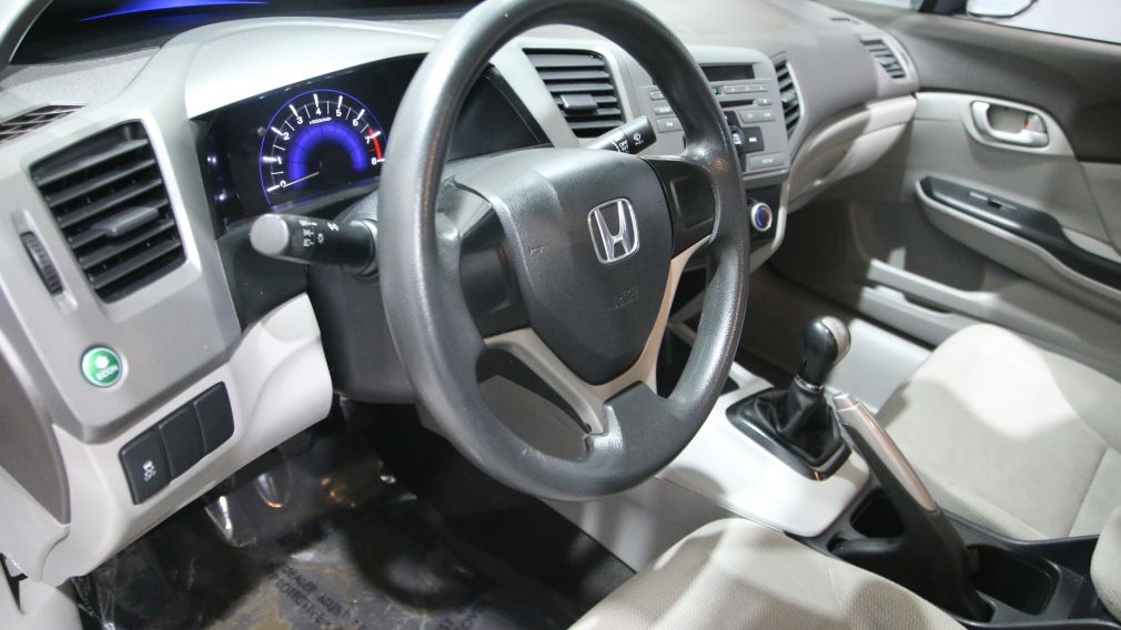 2012 Honda Civic DX MAGS #9