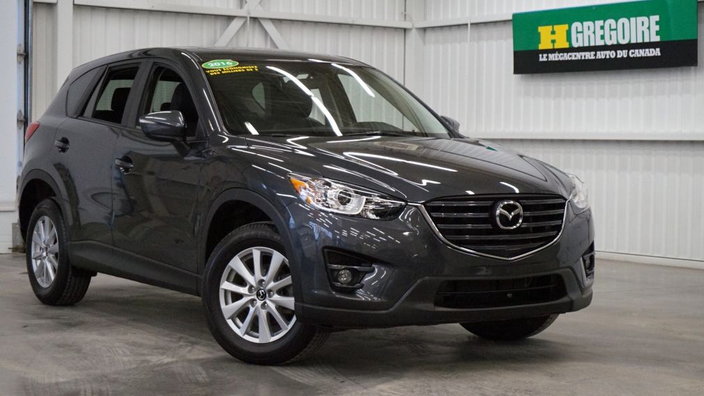 2016 Mazda CX 5 Touring AWD (cuir-caméra-navi-toit) #0